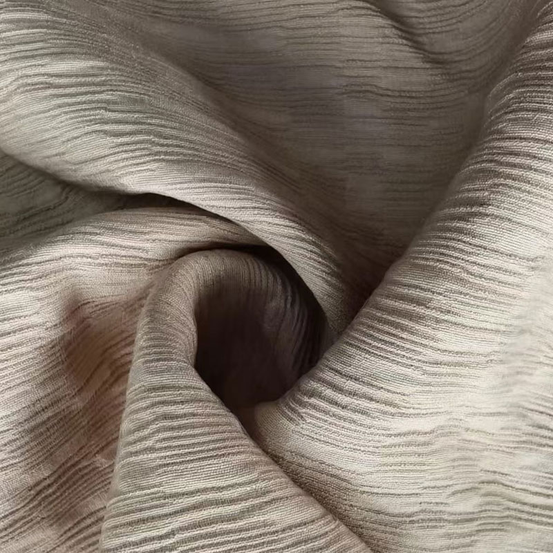 Jacquard enkelfilament nylon rayontyg med distinkt veckad textur